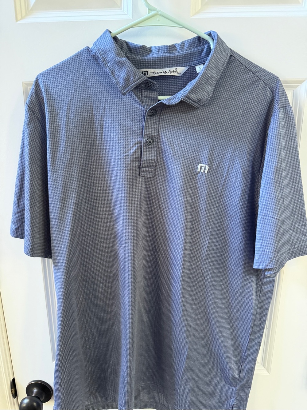 Travis Mathew Men's Heathered Navy Polo